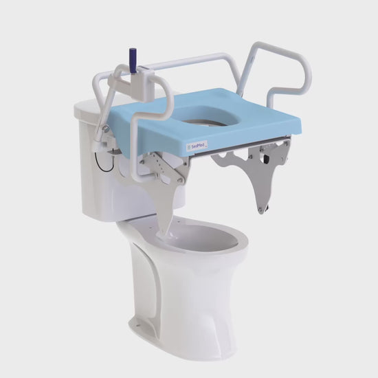 SedMed Toilet Lift Assist with light blue padded seat installed on a standard toilet